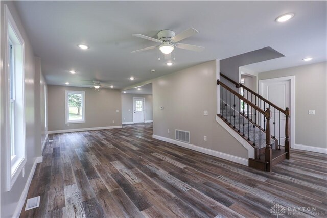 506 Linden Ave, Dayton, OH 45403 - unfurnished living room featuring a ceiling fan, dark wood-type flooring, stairway, and recessed lighting