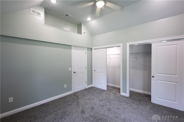 506 Linden Ave, Dayton, OH 45403 - unfurnished bedroom with vaulted ceiling, multiple closets, carpet flooring, and a ceiling fan