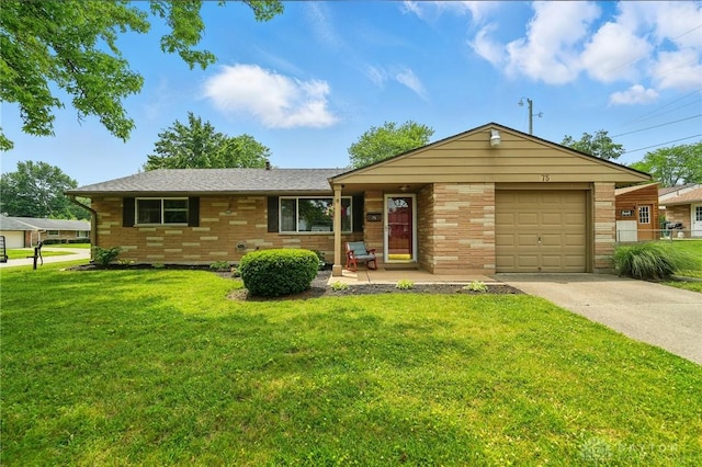 75 Royal Dr, Springboro, OH 45066 - single story home with an attached garage, a front yard, concrete driveway, and brick siding