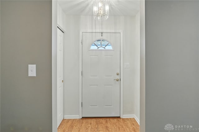 75 Royal Dr, Springboro, OH 45066 - foyer with a chandelier and light wood finished floors