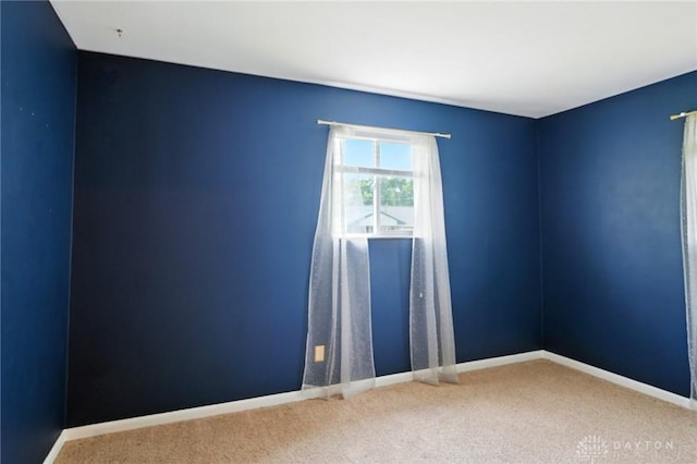 75 Royal Dr, Springboro, OH 45066 - carpeted empty room with baseboards