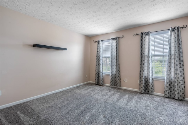 1928 Spring Ridge Dr, Xenia, OH 45385 - carpeted spare room featuring a textured ceiling