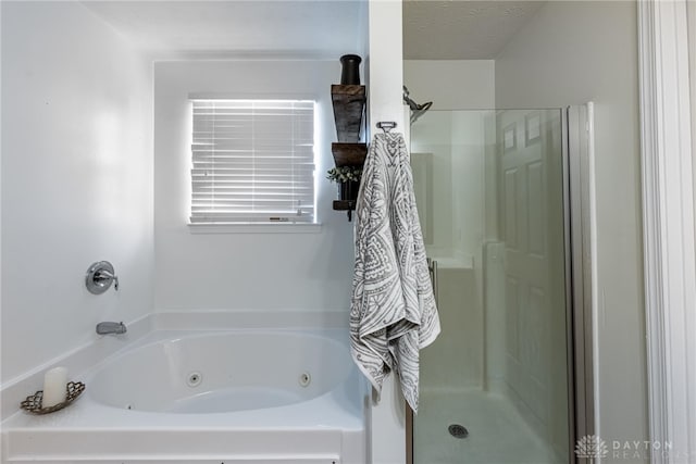 1928 Spring Ridge Dr, Xenia, OH 45385 - full bath featuring a shower stall and a jetted tub