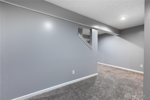 1928 Spring Ridge Dr, Xenia, OH 45385 - finished basement featuring carpet flooring, a textured ceiling, and recessed lighting