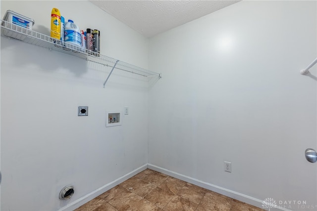 1928 Spring Ridge Dr, Xenia, OH 45385 - laundry room with washer hookup, hookup for an electric dryer, and a textured ceiling