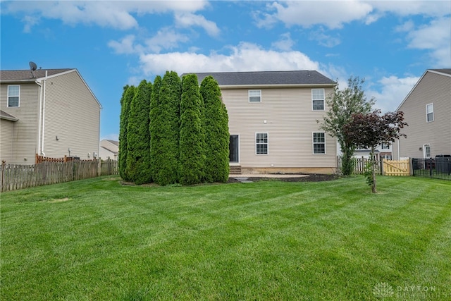 1928 Spring Ridge Dr, Xenia, OH 45385 - back of house featuring a fenced backyard