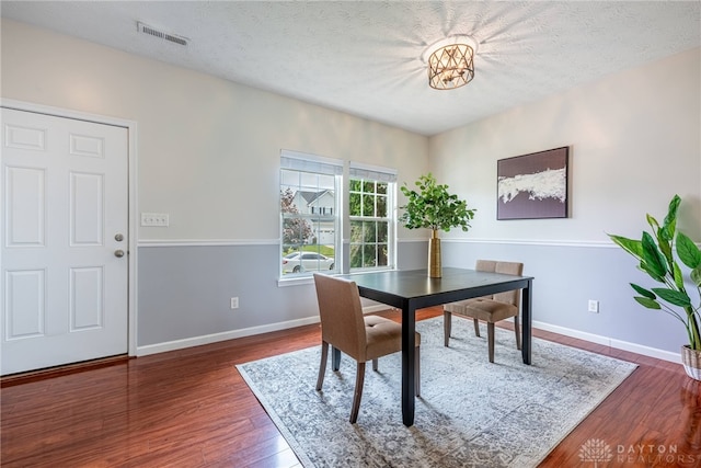 1928 Spring Ridge Dr, Xenia, OH 45385 - dining space featuring wood finished floors and a textured ceiling
