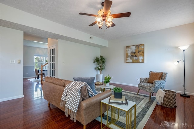 1928 Spring Ridge Dr, Xenia, OH 45385 - living area with wood finished floors, a textured ceiling, and ceiling fan