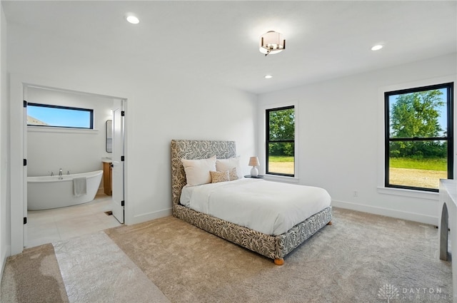 8559 Wandering Brook Way, Waynesville, OH 45068 - carpeted bedroom with recessed lighting and connected bathroom