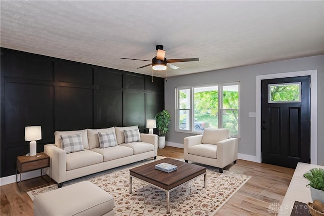 390 Washington Ave, Wilmington, OH 45177 - living area with a ceiling fan and light wood-type flooring