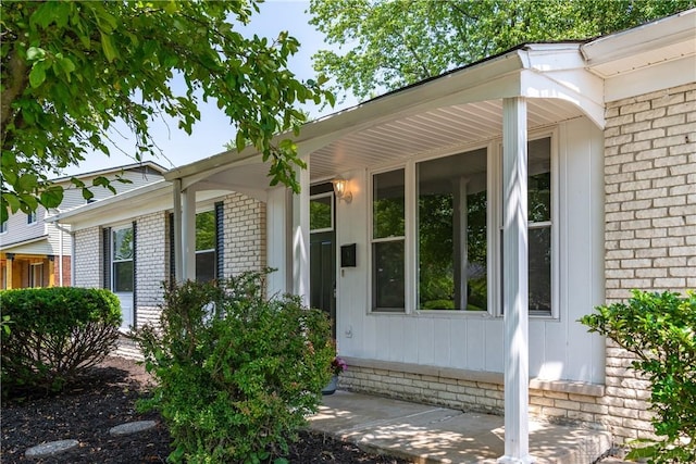 390 Washington Ave, Wilmington, OH 45177 - view of exterior entry featuring brick siding