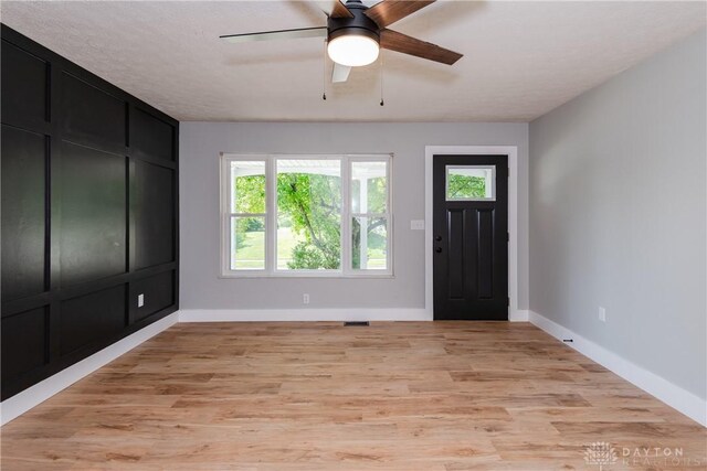 390 Washington Ave, Wilmington, OH 45177 - entrance foyer with light wood-type flooring and ceiling fan