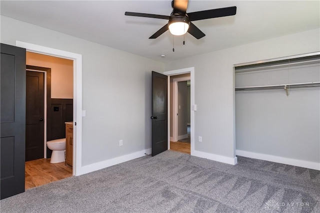 390 Washington Ave, Wilmington, OH 45177 - unfurnished bedroom featuring a closet, carpet, ensuite bath, and ceiling fan