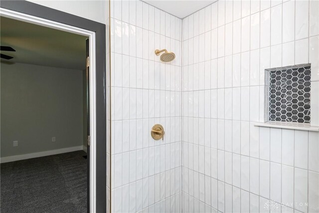 390 Washington Ave, Wilmington, OH 45177 - full bathroom featuring tiled shower and baseboards
