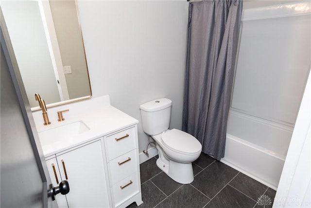 390 Washington Ave, Wilmington, OH 45177 - bathroom with vanity, shower / bath combo with shower curtain, and tile patterned flooring