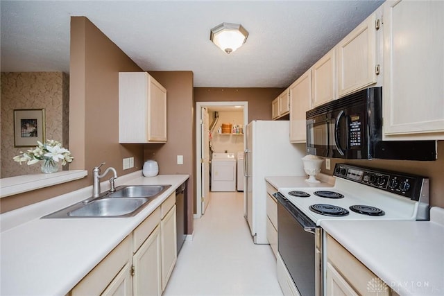 7636 Shawnee Ln Unit 206, West Chester, OH 45069 - kitchen featuring white appliances, washer and clothes dryer, light countertops, and light brown cabinets