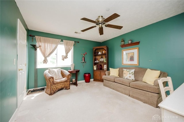 7636 Shawnee Ln Unit 206, West Chester, OH 45069 - carpeted living area featuring a ceiling fan and baseboards