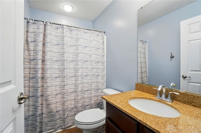 1956 Daffodil Dr, Xenia, OH 45385 - bathroom with vanity, a textured ceiling, and a shower with shower curtain
