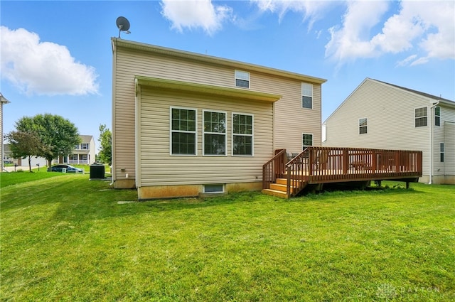 1956 Daffodil Dr, Xenia, OH 45385 - back of house featuring a deck and a yard