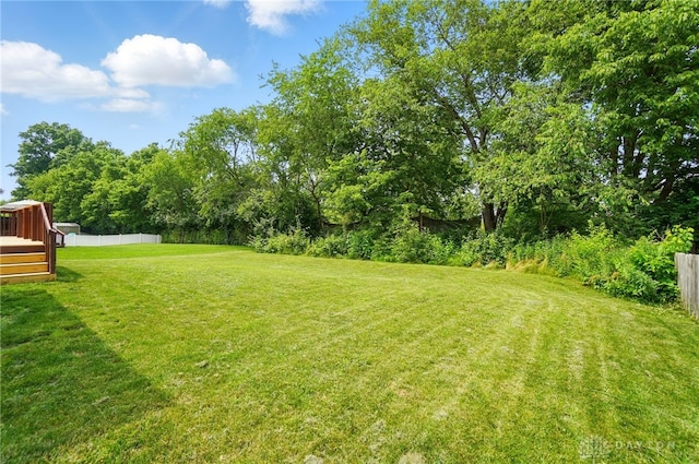 1956 Daffodil Dr, Xenia, OH 45385 - view of yard with a wooden deck