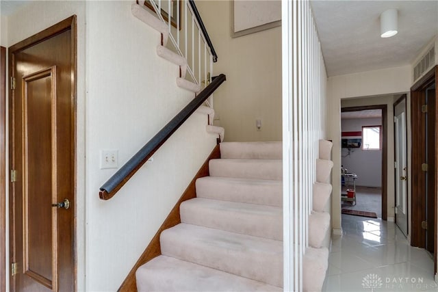 1952 Tait Circle Rd, Dayton, OH 45429 - staircase featuring tile patterned flooring
