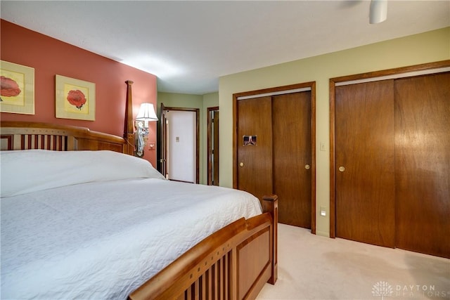 1952 Tait Circle Rd, Dayton, OH 45429 - bedroom featuring light carpet, multiple closets, and ceiling fan