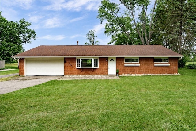 1864 E Lytle 5 Points Rd Unit R, Centerville, OH 45458 - ranch-style home featuring asphalt driveway, an attached garage, a front yard, and brick siding