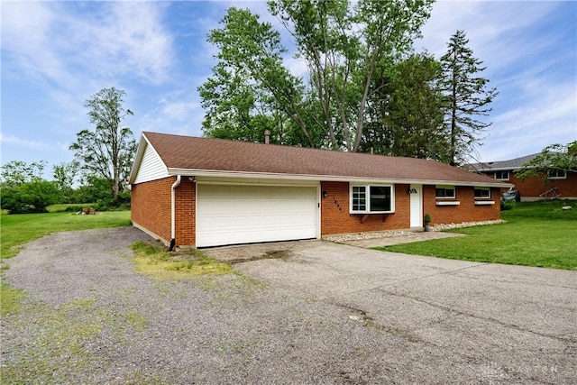 1864 E Lytle 5 Points Rd Unit R, Centerville, OH 45458 - ranch-style home featuring brick siding, an attached garage, driveway, and a front yard