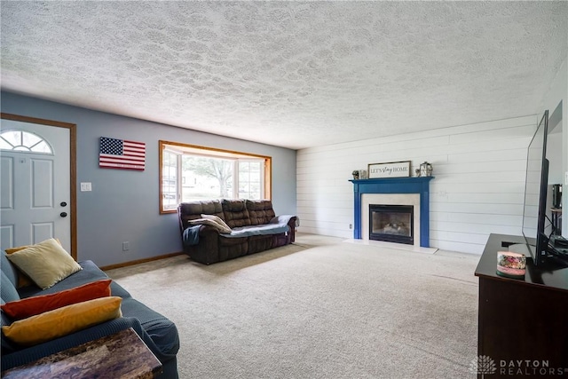 1864 E Lytle 5 Points Rd Unit R, Centerville, OH 45458 - living area with a textured ceiling, a fireplace with flush hearth, and carpet floors