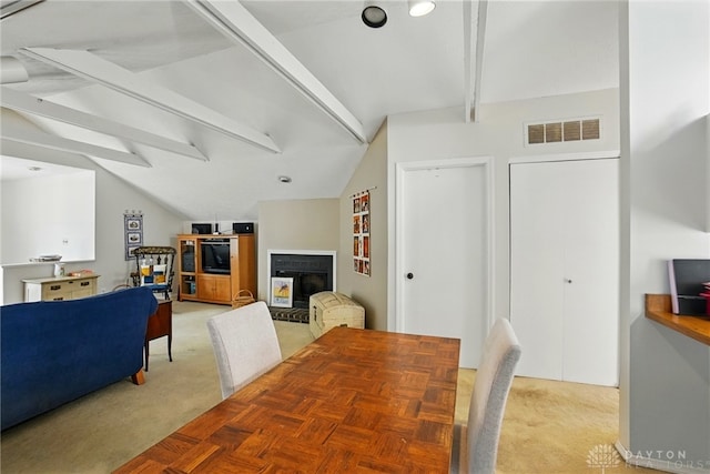 3127 Gracemore Ave, Kettering, OH 45420 - dining room with light carpet and a multi sided fireplace