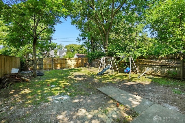 57 S Torrence St, Dayton, OH 45403 - fenced backyard with a playground