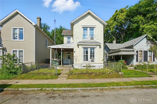 57 S Torrence St, Dayton, OH 45403 - view of front facade featuring a porch, brick siding, a fenced front yard, and cooling unit