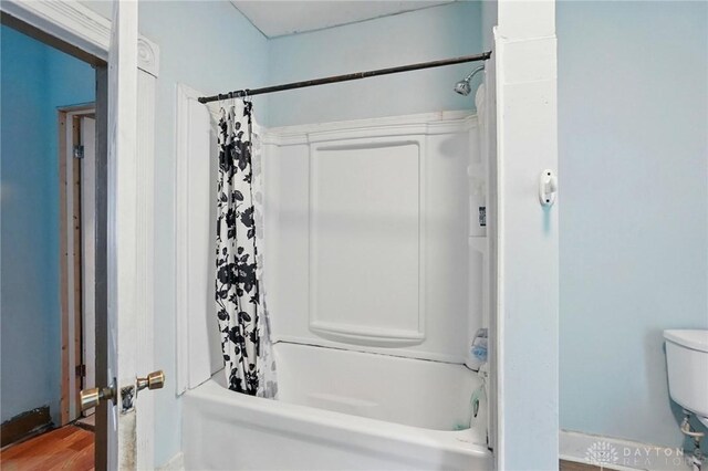 57 S Torrence St, Dayton, OH 45403 - full bathroom with shower / bathtub combination with curtain and wood finished floors