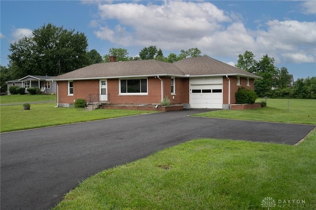 3372 Home Acres Ave, Beavercreek, OH 45431 - ranch-style home with an attached garage, brick siding, driveway, a chimney, and a front lawn