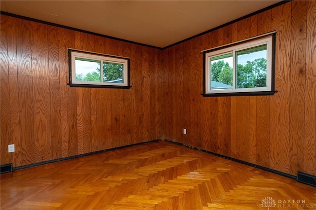 3372 Home Acres Ave, Beavercreek, OH 45431 - spare room with plenty of natural light and wooden walls