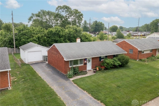 2151 Newgate Ave, Dayton, OH 45420 - ranch-style house featuring a garage, brick siding, an outdoor structure, a chimney, and roof with shingles