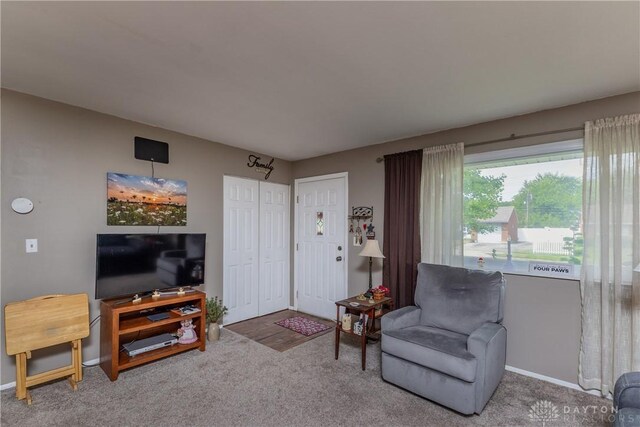 2151 Newgate Ave, Dayton, OH 45420 - carpeted living room featuring baseboards