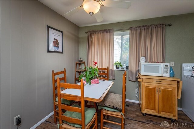 2151 Newgate Ave, Dayton, OH 45420 - dining area with dark wood-style flooring, ceiling fan, and washer / dryer