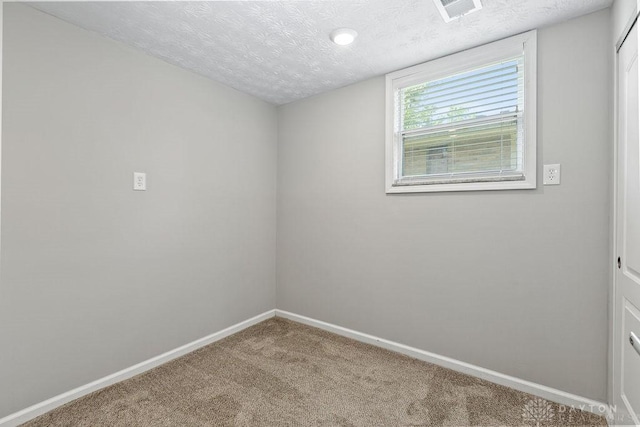 6814 Rushleigh Rd, Englewood, OH 45322 - carpeted spare room featuring baseboards and a textured ceiling