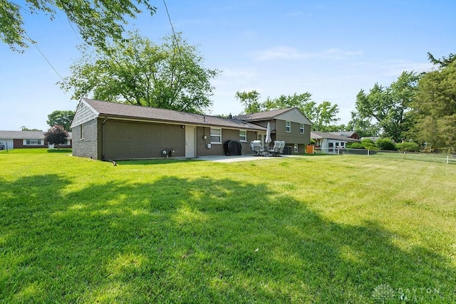 6814 Rushleigh Rd, Englewood, OH 45322 - rear view of property featuring a patio area
