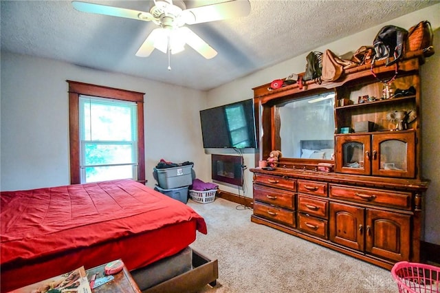 2457 Wilbraham Rd, Middletown, OH 45042 - bedroom with a textured ceiling, carpet floors, and a ceiling fan