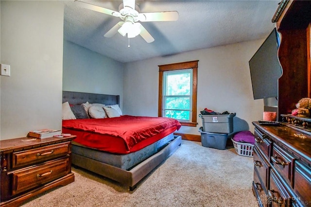 2457 Wilbraham Rd, Middletown, OH 45042 - carpeted bedroom with a textured ceiling and a ceiling fan