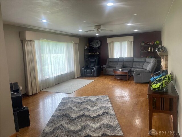 311 Swailes Rd, Troy, OH 45373 - living area with wood finished floors, a ceiling fan, and recessed lighting