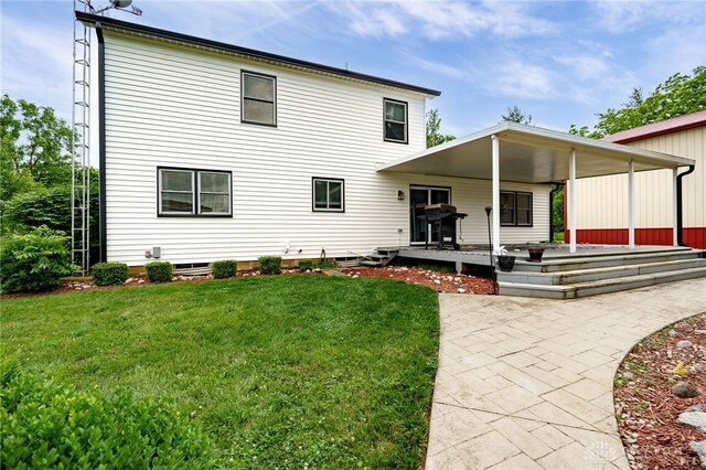 8282 Hile Ln, Germantown, OH 45327 - rear view of house featuring a yard