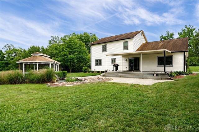 8282 Hile Ln, Germantown, OH 45327 - back of house featuring a patio, a gazebo, and a lawn