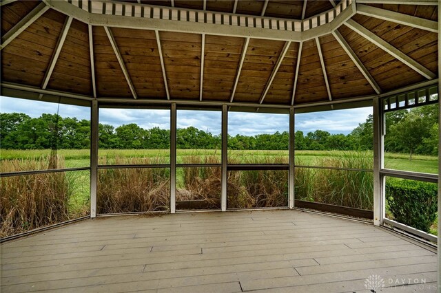 8282 Hile Ln, Germantown, OH 45327 - unfurnished sunroom featuring view of wooded area and plenty of natural light