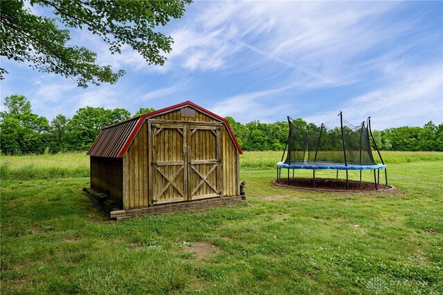 8282 Hile Ln, Germantown, OH 45327 - view of shed with a trampoline