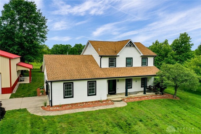 8282 Hile Ln, Germantown, OH 45327 - view of front of property with a porch, a front lawn, and a shingled roof