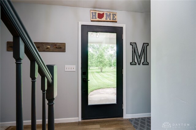 8282 Hile Ln, Germantown, OH 45327 - entryway with stairs and wood finished floors