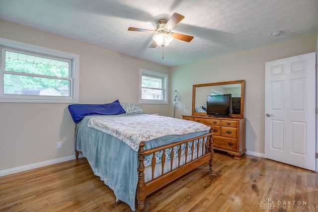 5807 Twin Pine Ln, Miami Twp, OH 45449 - bedroom with light wood-type flooring and a ceiling fan